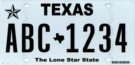California license plate with the text 'TEXAS' at the top, large characters 'ABC 1234' in the middle, a Texas shape icon, and the phrase 'The Lone Star State' at the bottom.