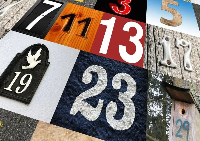 A collage of various outdoor sign numbers and decorations, including house numbers and date plaques.