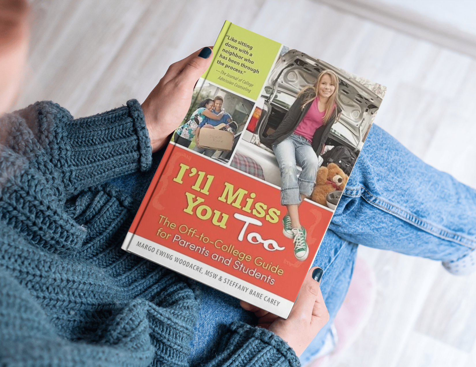 Person wearing a blue knit sweater and jeans reading a book titled "I’ll Miss You Too," a college guide for parents and students, with a picture of a young woman sitting on the back of a car trunk smiling, surrounded by stuffed animals and a cardboard box.