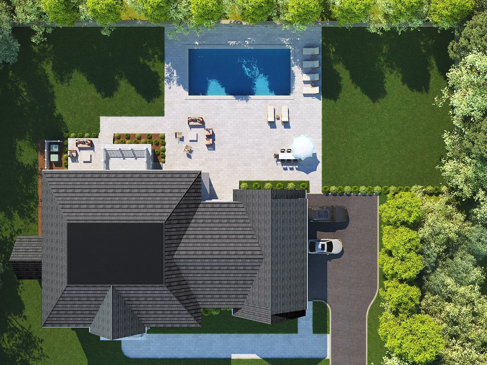 Aerial view of a backyard featuring a swimming pool, patio furniture, a grassy area, and a driveway with parked cars, surrounded by trees.