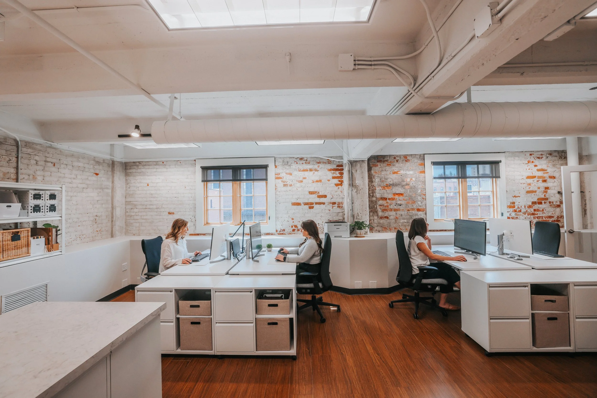 Hatch Interiors office with team members working at desks