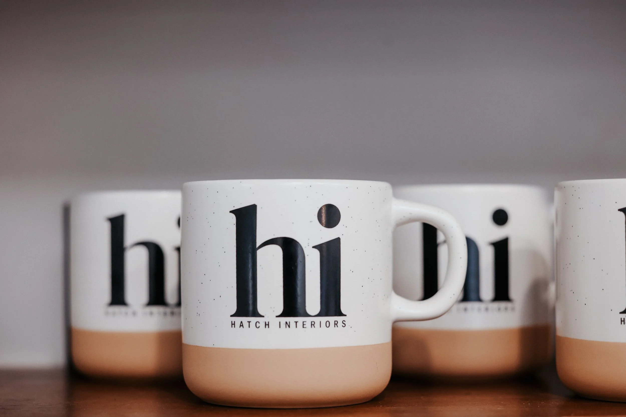 Hatch Interiors custom logo coffee mugs