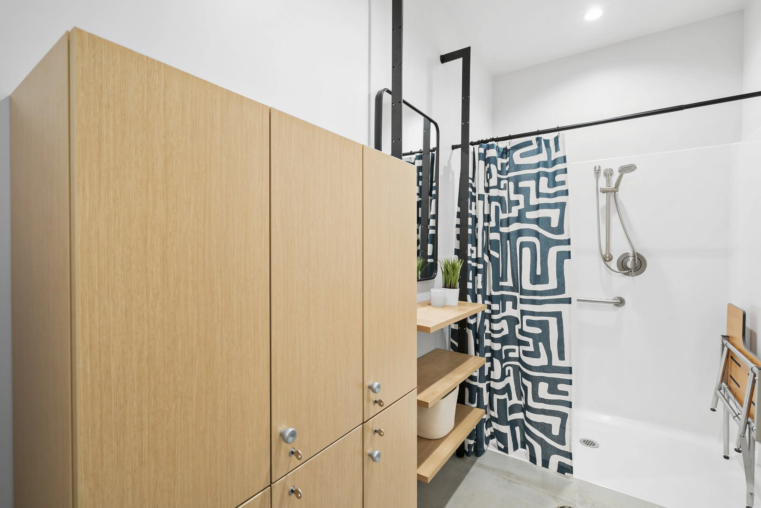 Western Insurance bathroom with custom locker spaces and shower