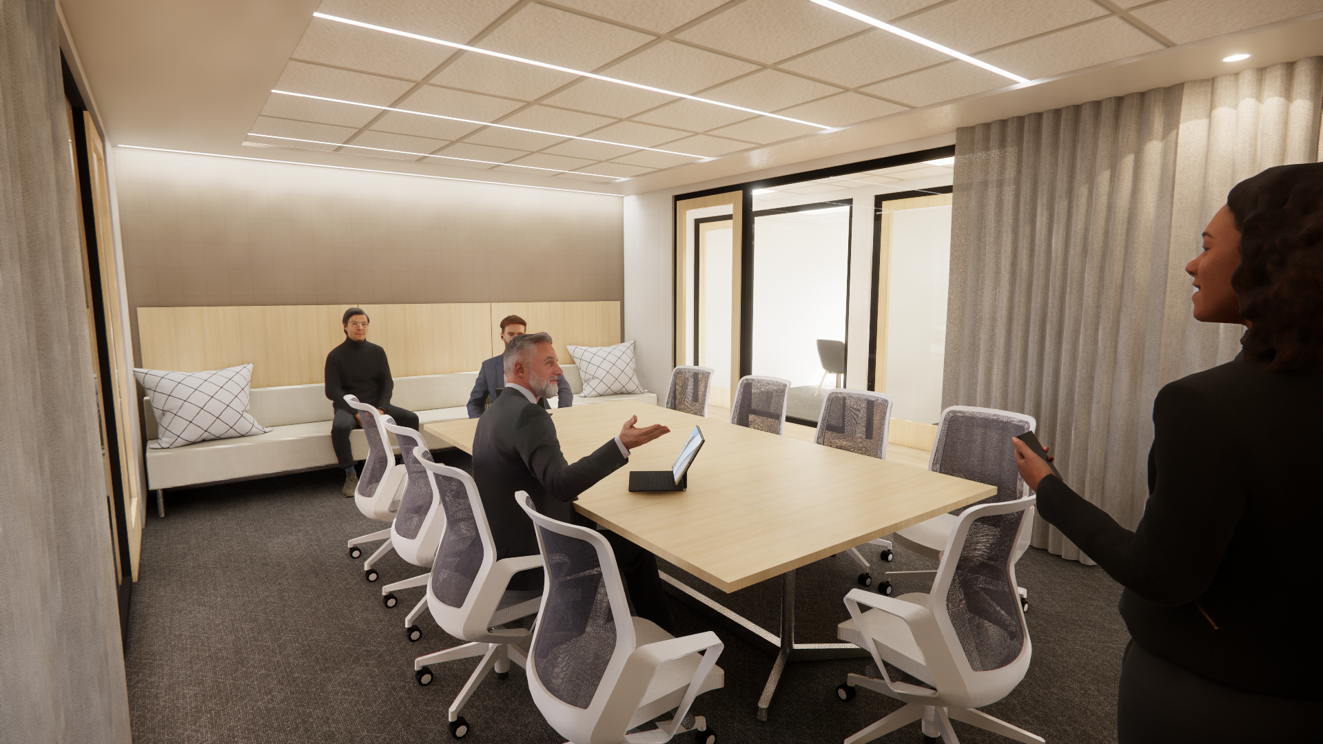 Office conference room with several chairs and a large couch against the back wall