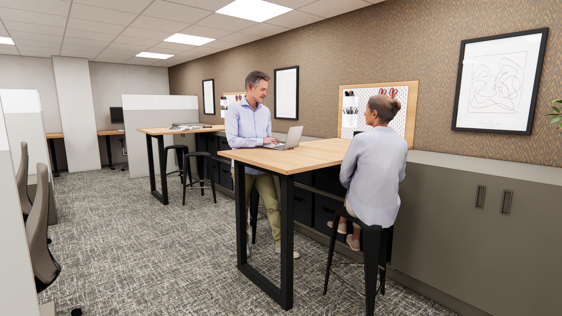 Interior of a modern office space with cubicles, desks with monitors, and a meeting area