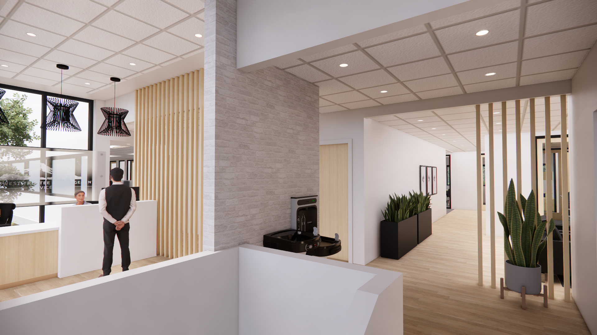 Modern office reception area with a front desk, a person standing nearby, wood accents, pendant lights, and a hallway with glass doors leading to offices.