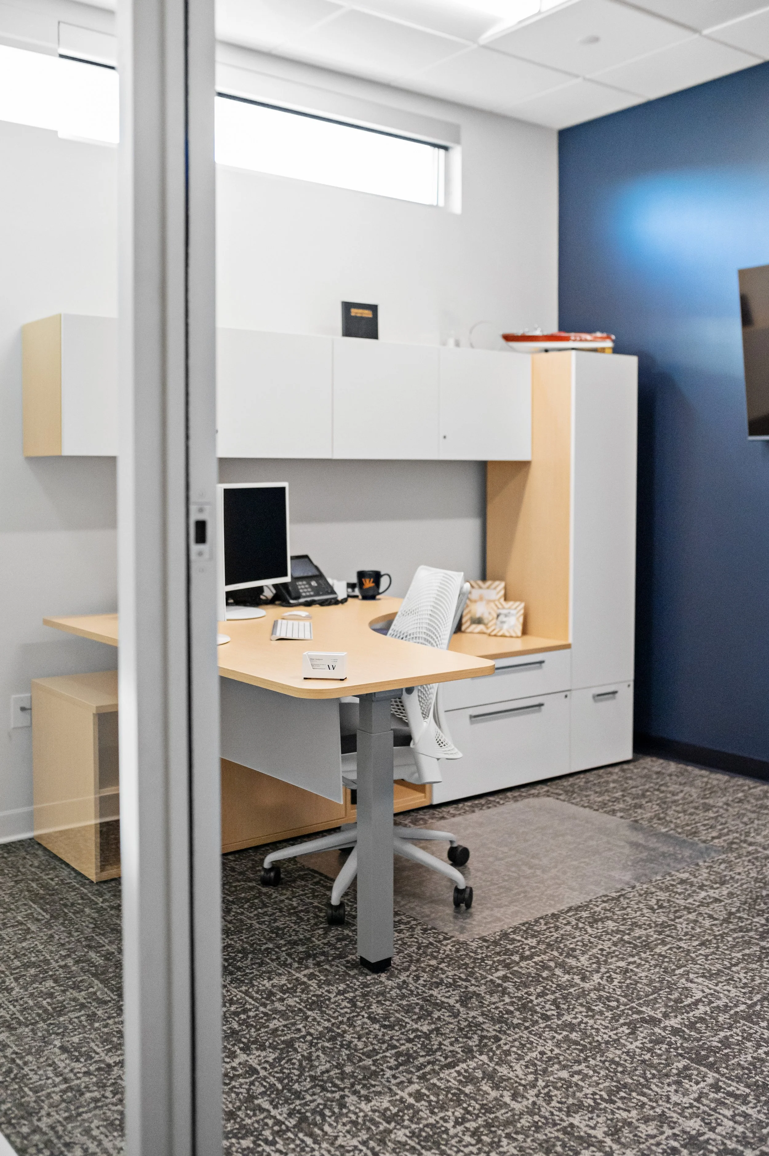 Western Insurance office workspace with a wooden desk