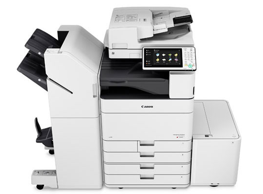 A large modern multi-function office copier and printer with multiple paper trays and a touchscreen control panel.