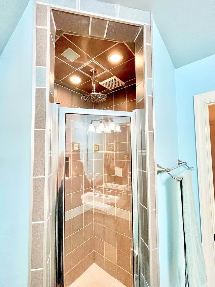 Bathroom with walk-in shower at Jasmine Suite