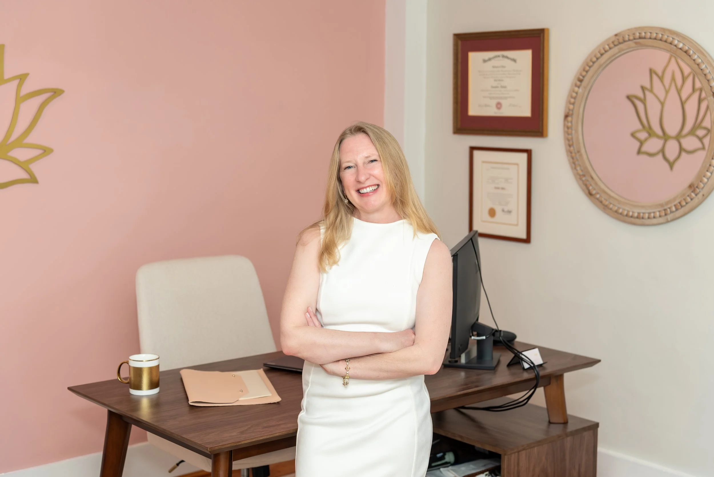 Jennifer Hatch, collaborative divorce attorney, is seated in a calm office setting for amicable divorce support in Massachusetts.