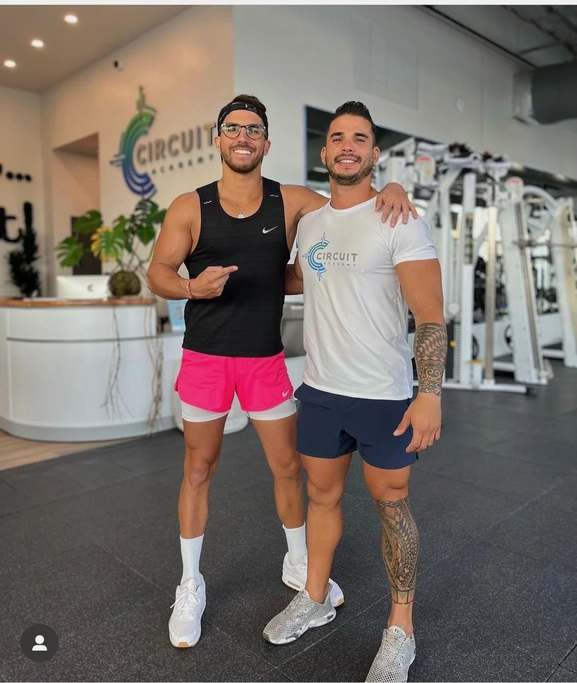 A picture of Daniel Daniel, Certified Personal Trainer, with one of his clients at the gym.