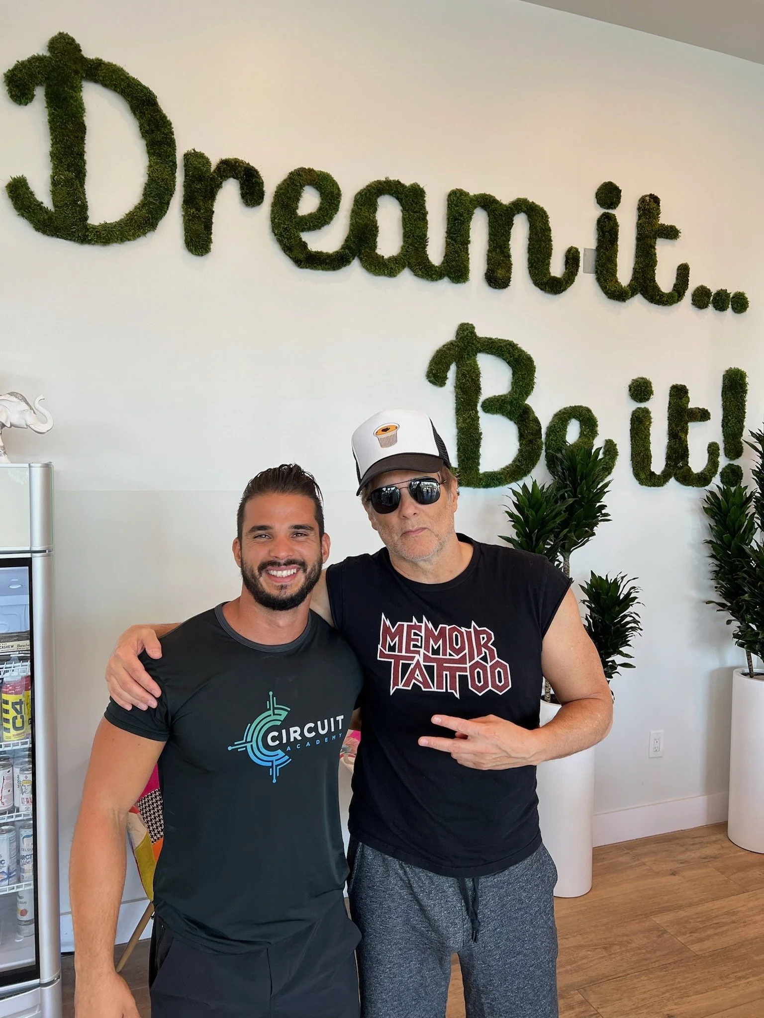 A picture of Daniel Daniel, Certified Personal Trainer, with one of his clients at the gym.