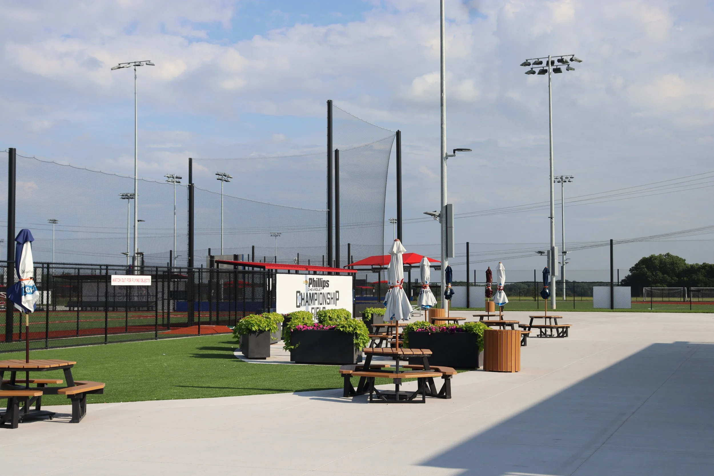 Professional backstop and barrier netting systems at Phillips Championship multi-diamond baseball complex