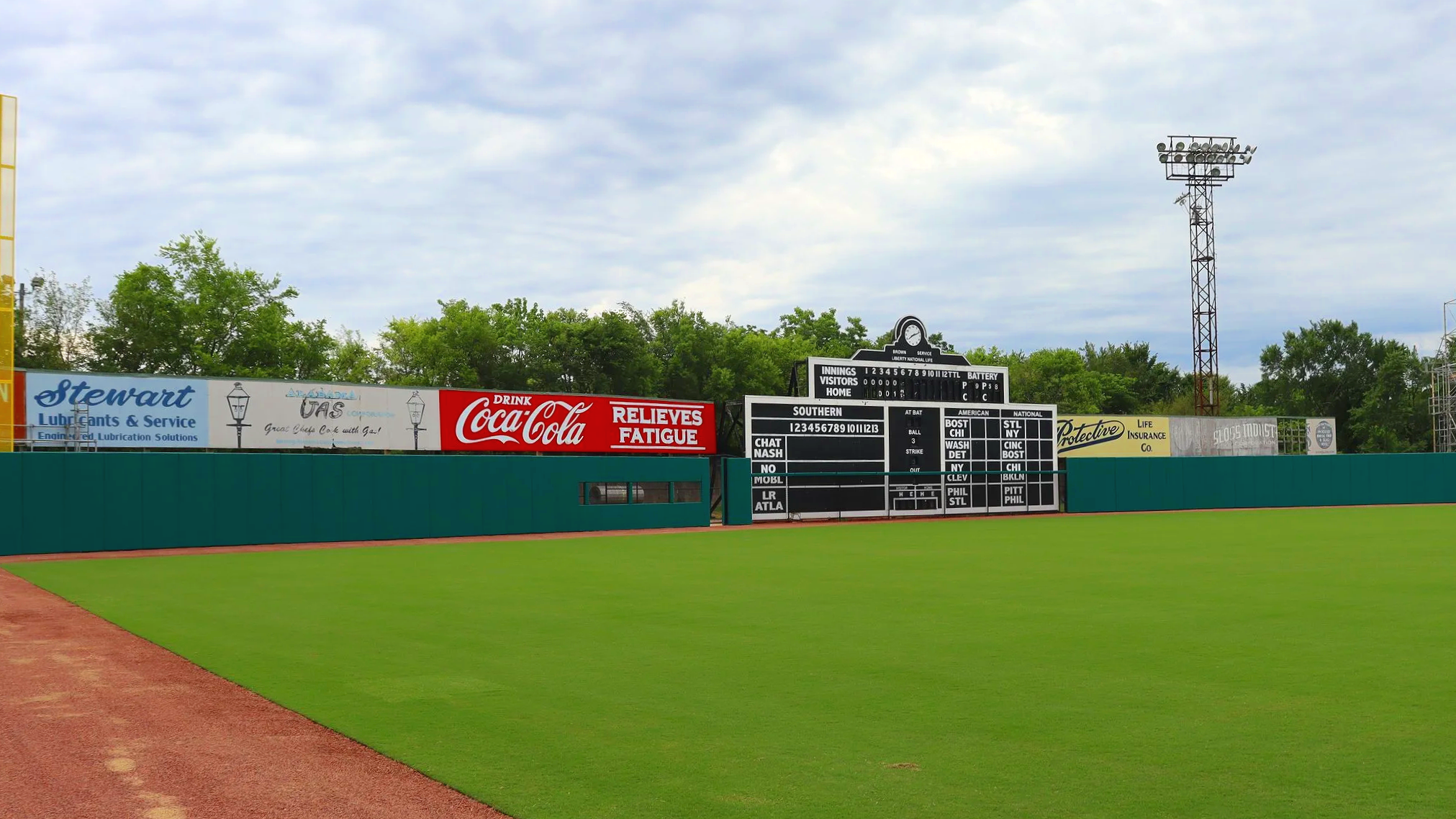 Your outfield wall padding is already there — or it should be. USS custom branded padding panels let you protect your athletes and sell that same surface as sponsorship inventory at the same time. As seen here at historic Rickwood Field in Birmingham