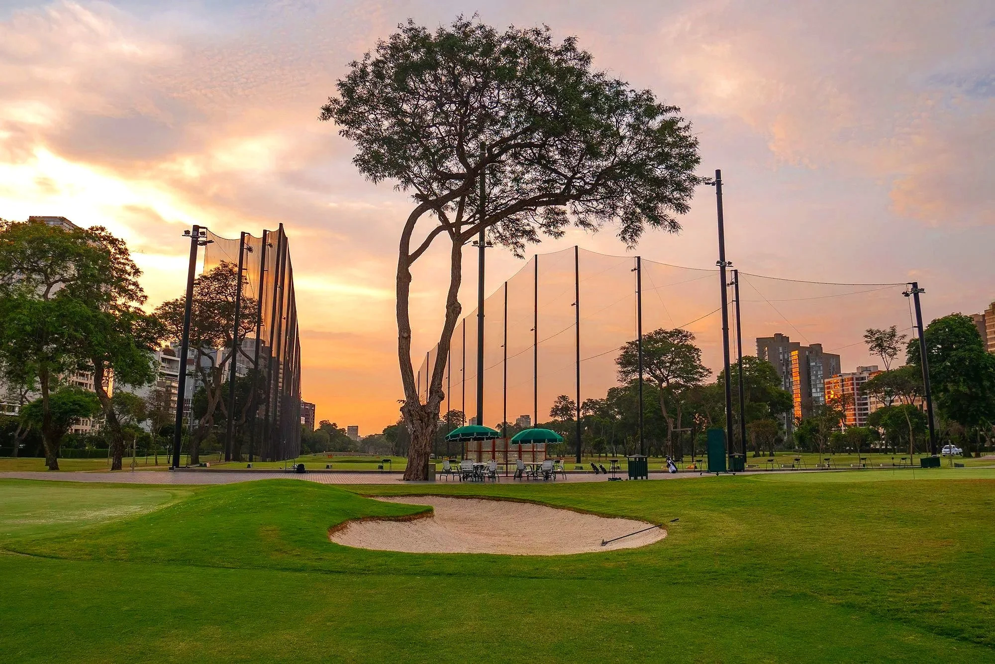 From Nebraska to Lima, Peru — USS supplies professional sports field netting systems for athletic facilities across the country and around the world. Golf driving range barrier netting installed at sunset, supplied by USS.