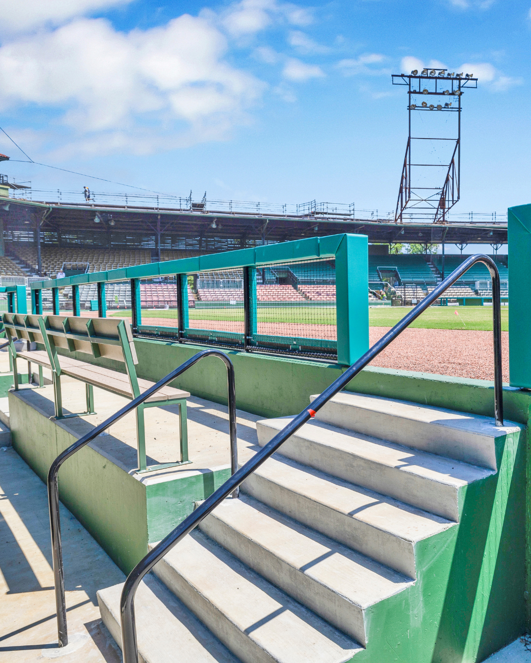 Spectator protective netting system and grandstand seating at historic Rickwood Field baseball stadium