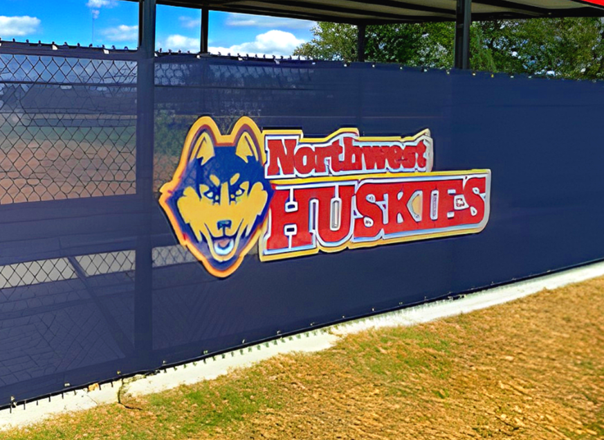 Custom branded Waverly Vikings windscreen on tennis and pickleball court fence line at Waverly High School in Waverly Nebraska — USS windscreen for sports fields supplier