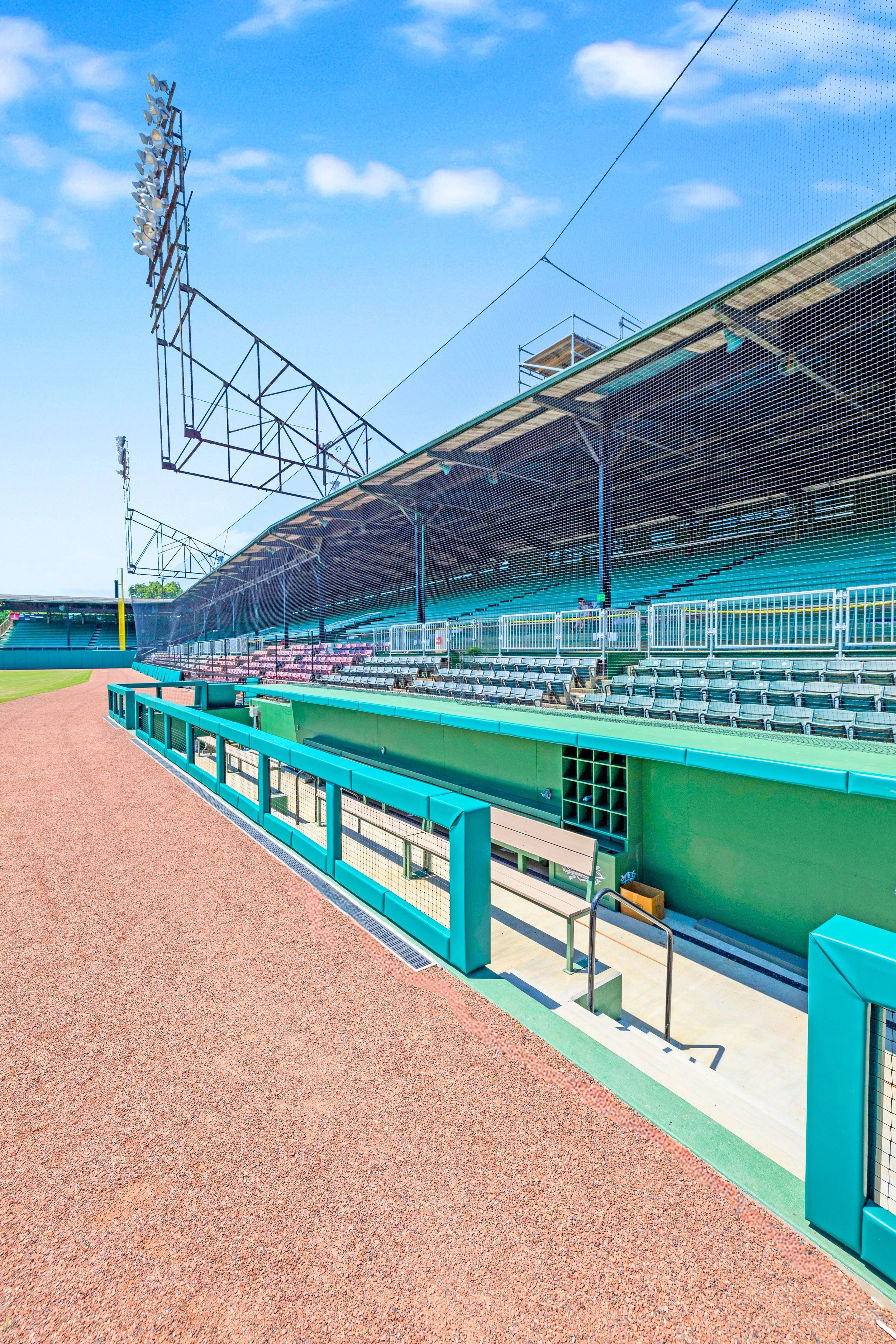Dugout and grandstand protective systems at historic Rickwood Field professional baseball venue Birmingham Alabama