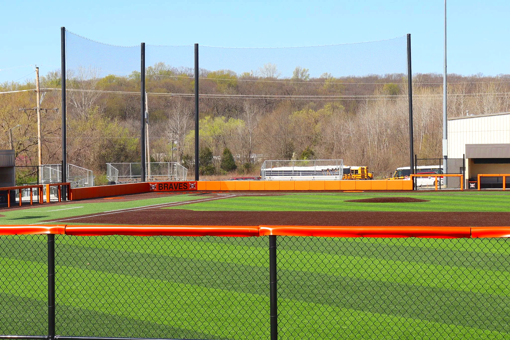  Orange fence cap on chain link fence at Braves baseball complex, Bonner Springs, Kansas