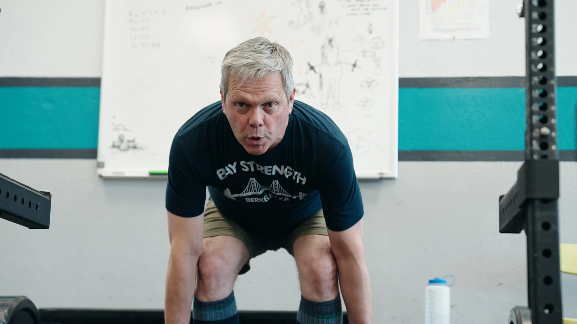 Client performing a deadlift at Bay Strength gym in Berkeley, CA