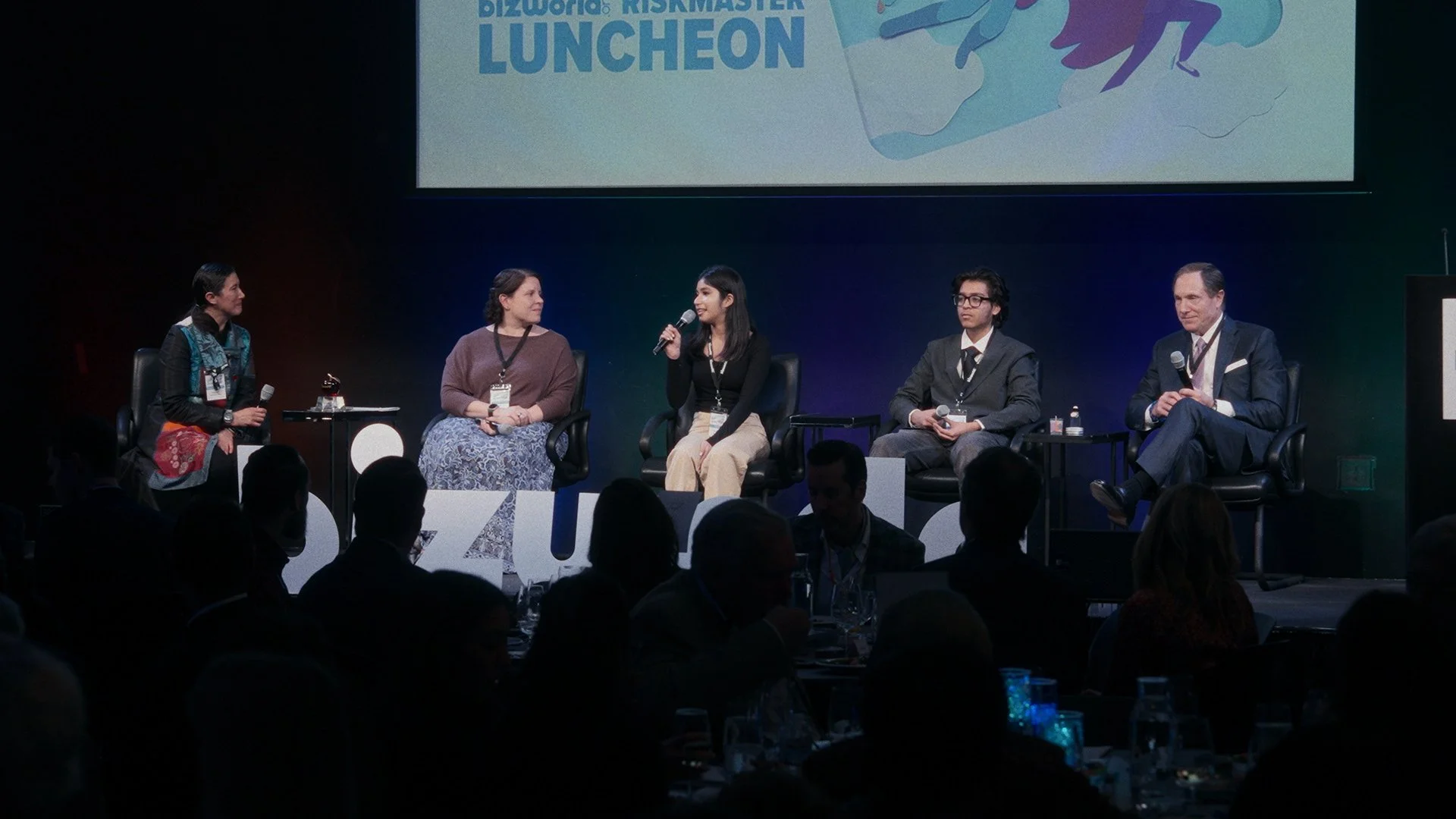 People talking at a Bizworld fundraiser event in Mountain View, CA