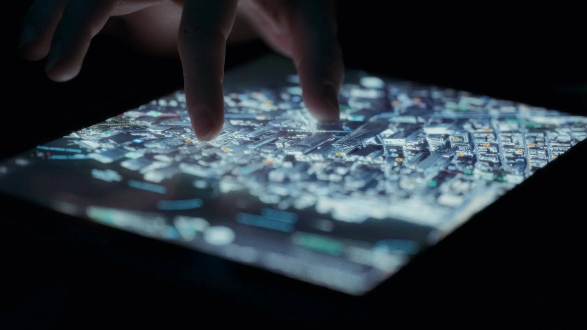 Hand touching a tablet
