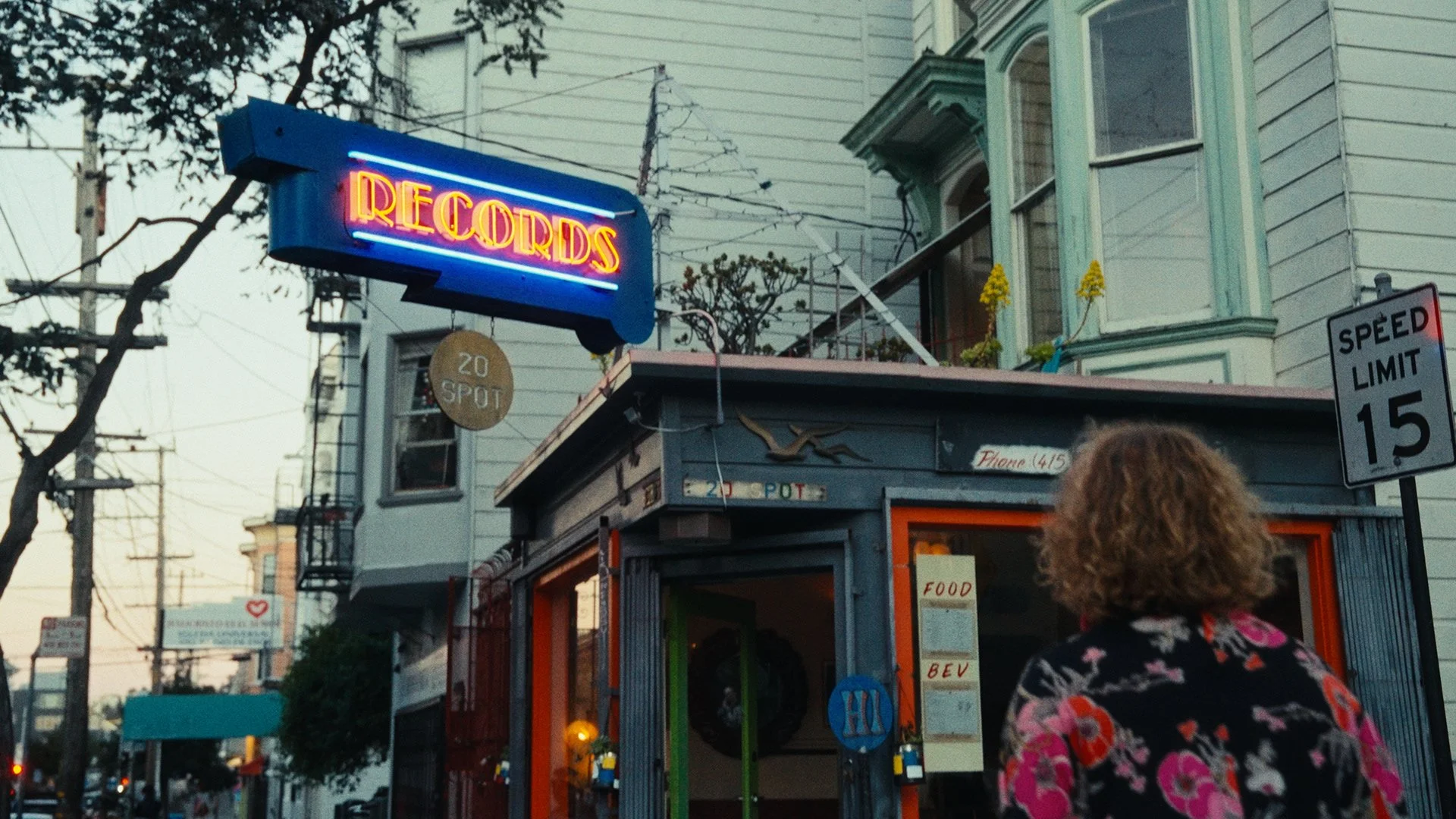 Food blogger walking into a bar in San Francisco, CA