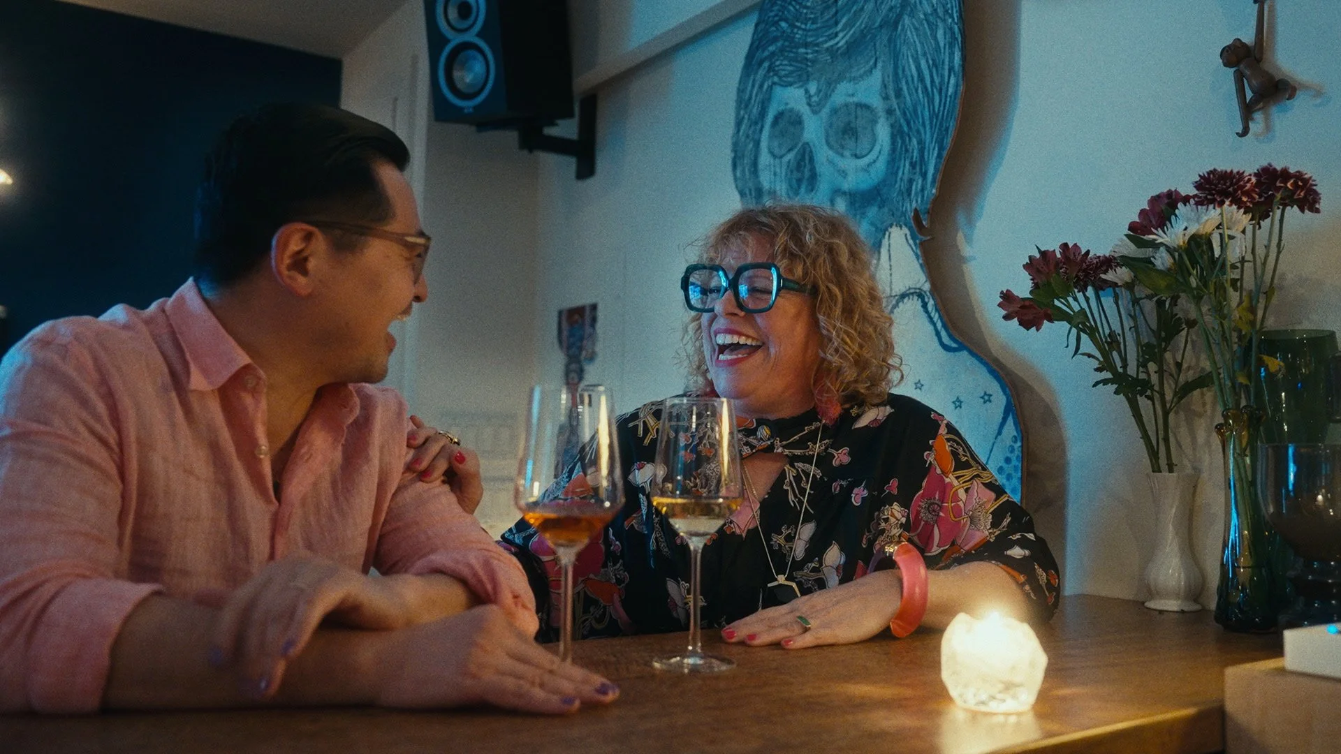 Food blogger drinks at a wine bar in San Francisco, CA