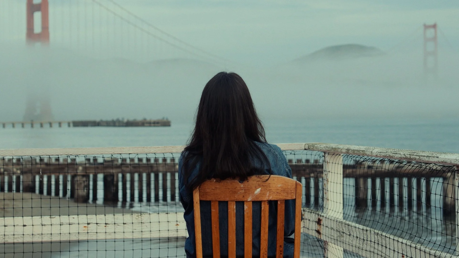 Artist Diane Dallas-Kidd looking at the Golden Gate Bridge in San Francisco, CA