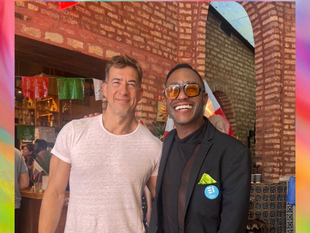 Photo with Secretary of State Alex Giannoulias at a pride brunch hosted by Equality Illinois
