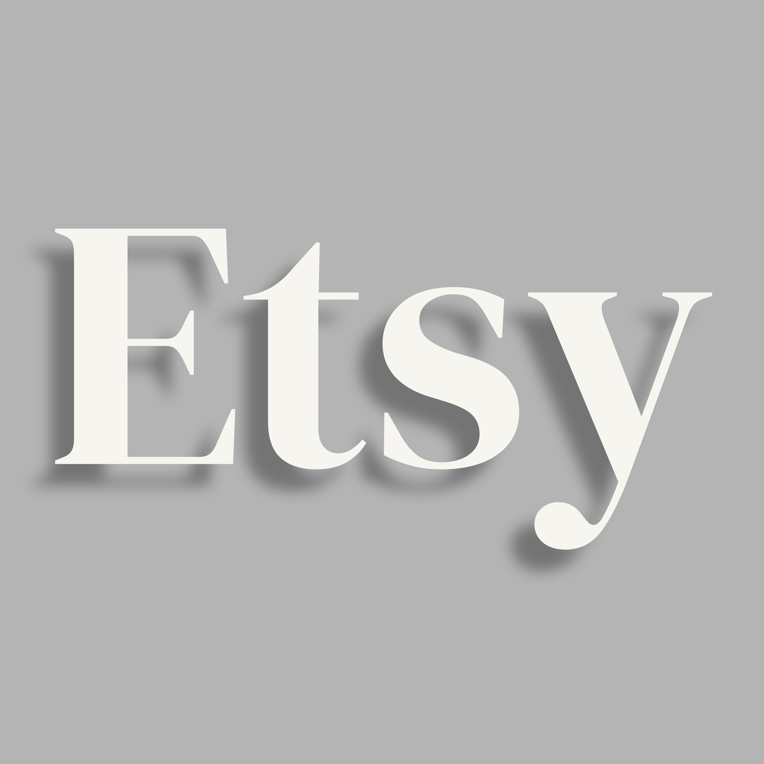 Close-up of a white letter 'E' on a gray background with shadow effect.