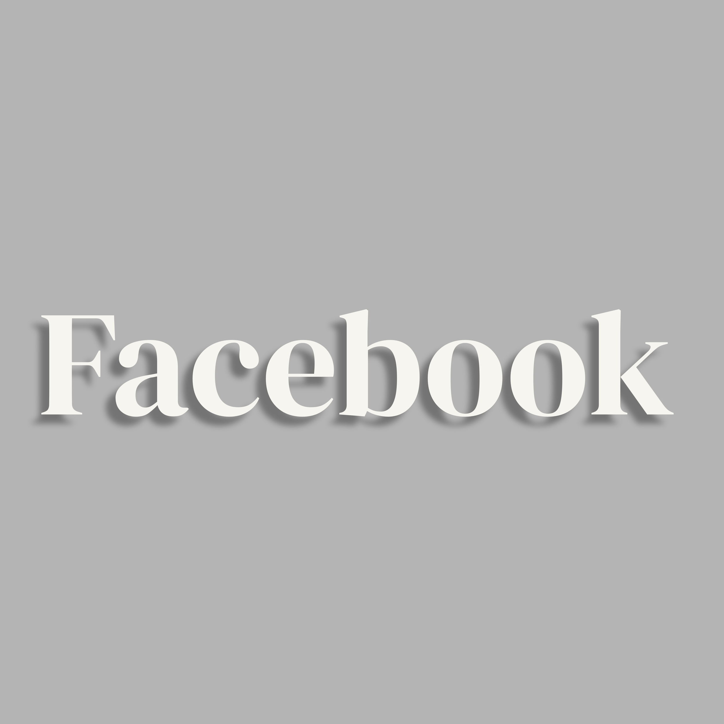 Close-up of a printed Facebook logo with a gray background.