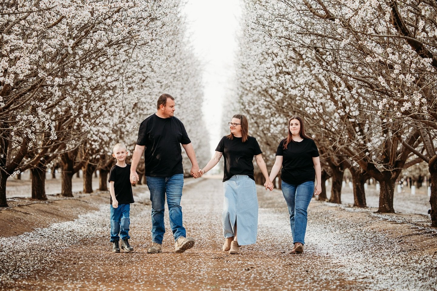 Each year, I get flooded with inquiries about capturing photos among the almond blossoms, but many miss the window. These fleeting beauties only bloom for a couple of weeks. To secure your spot for a session in the orchard, send me your details and I