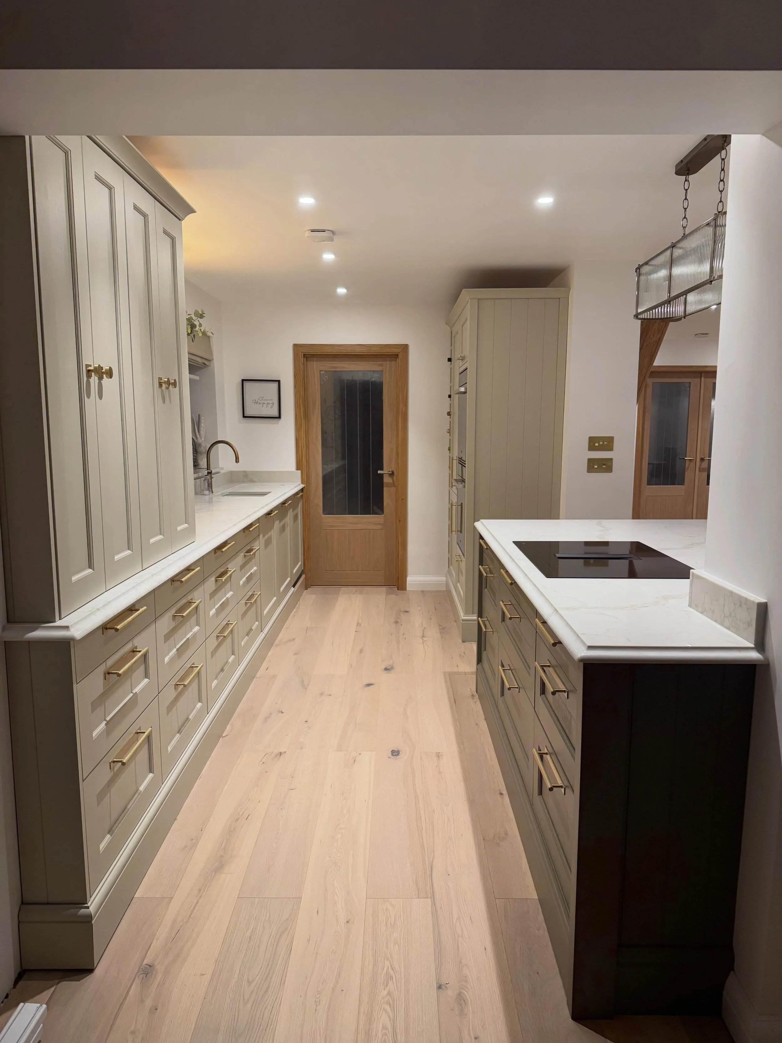 From concept to completion we can help you build your dream.

Here is an amazing kitchen transformation we completed including removal of a structural wall to open the space for a statement island.