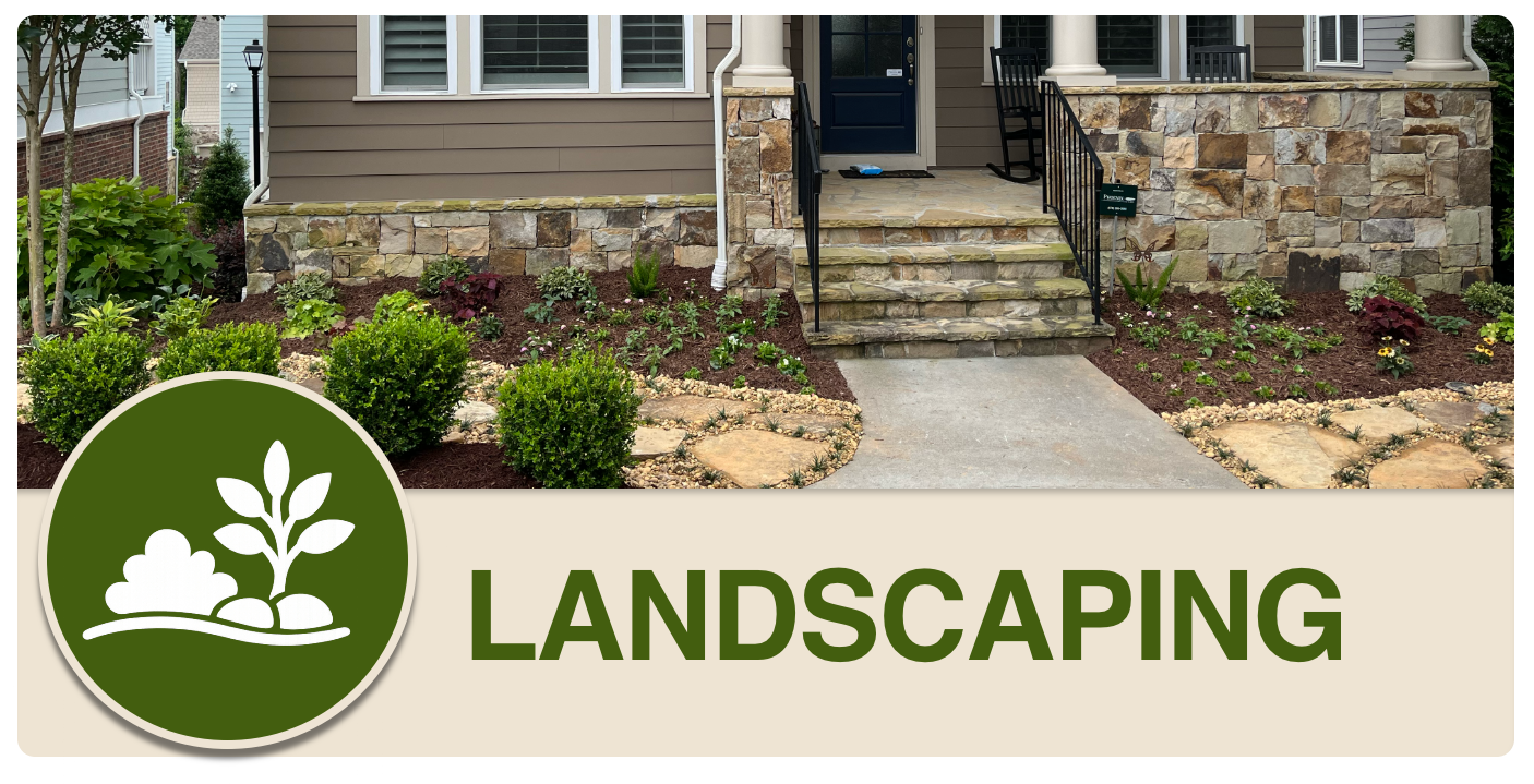 Front yard landscaping with stone steps, shrubs, and a garden bed in front of a house.
