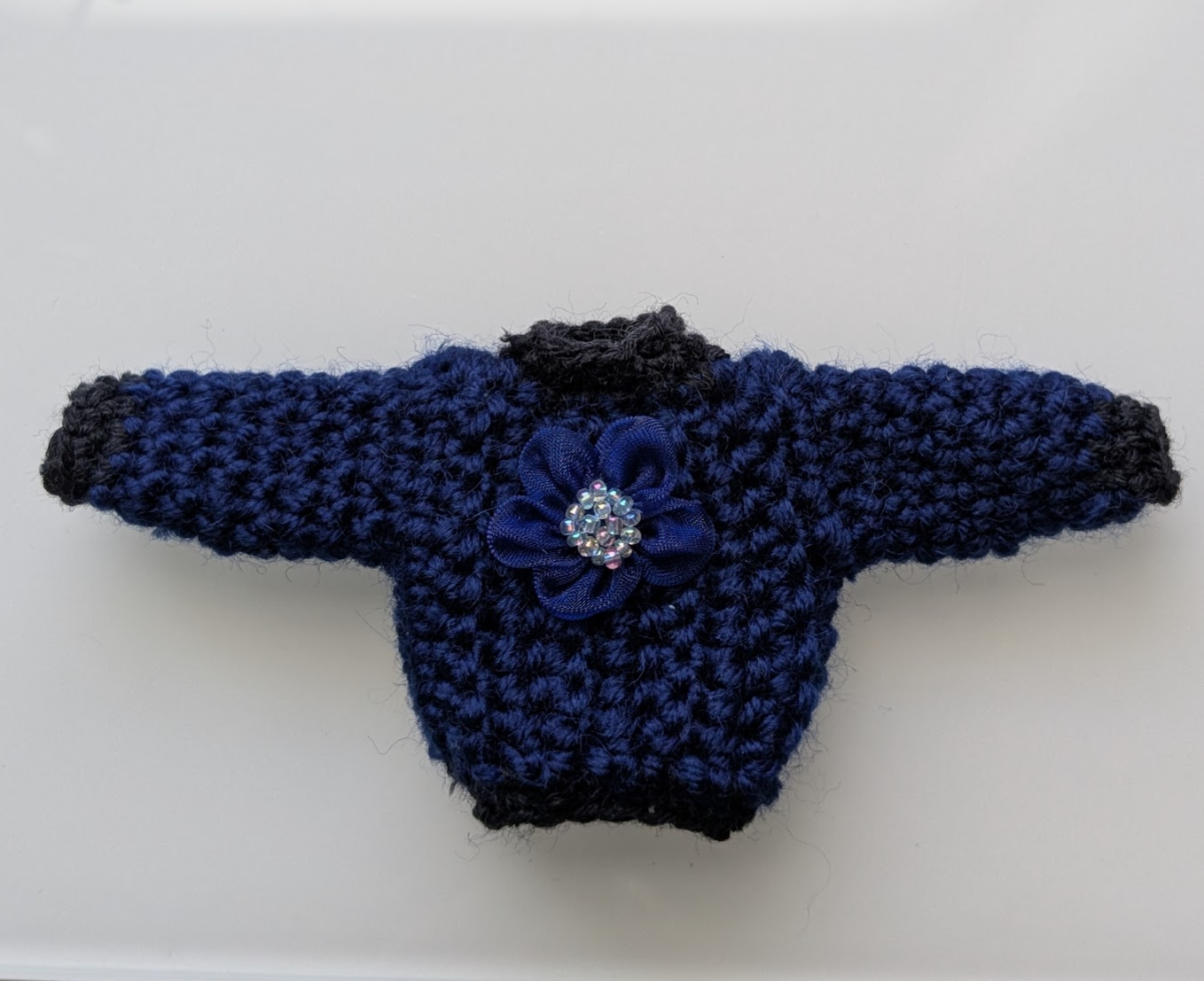Chunky navy Thumb Jumper with blue flower
