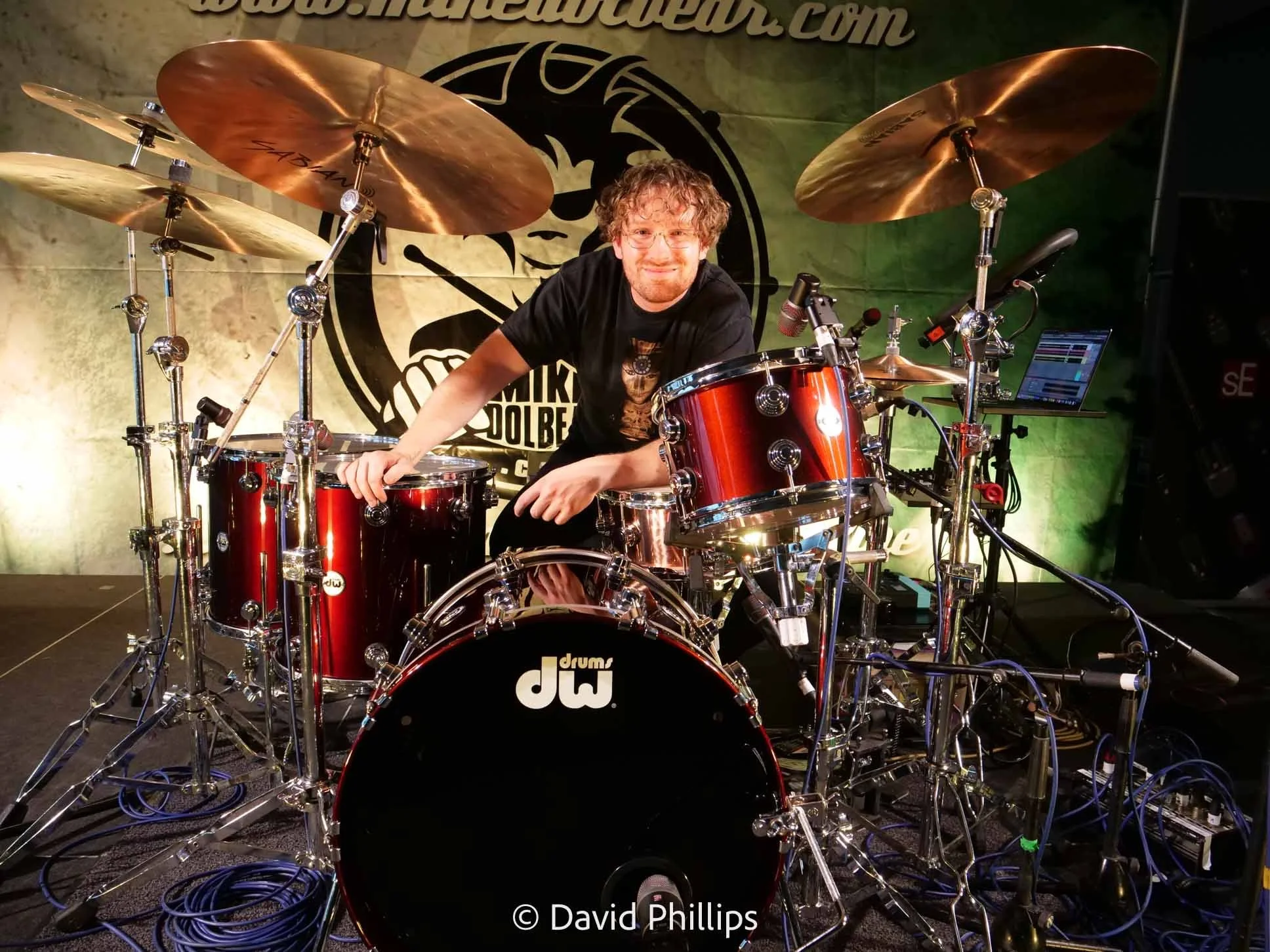 A photo of James Compton behind his kit at the UK Drum Show. Photo by David Phillips