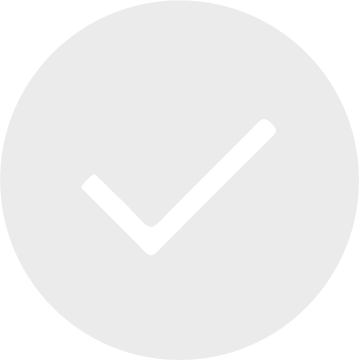 Símbolo de una marca de verificación en un círculo gris claro.