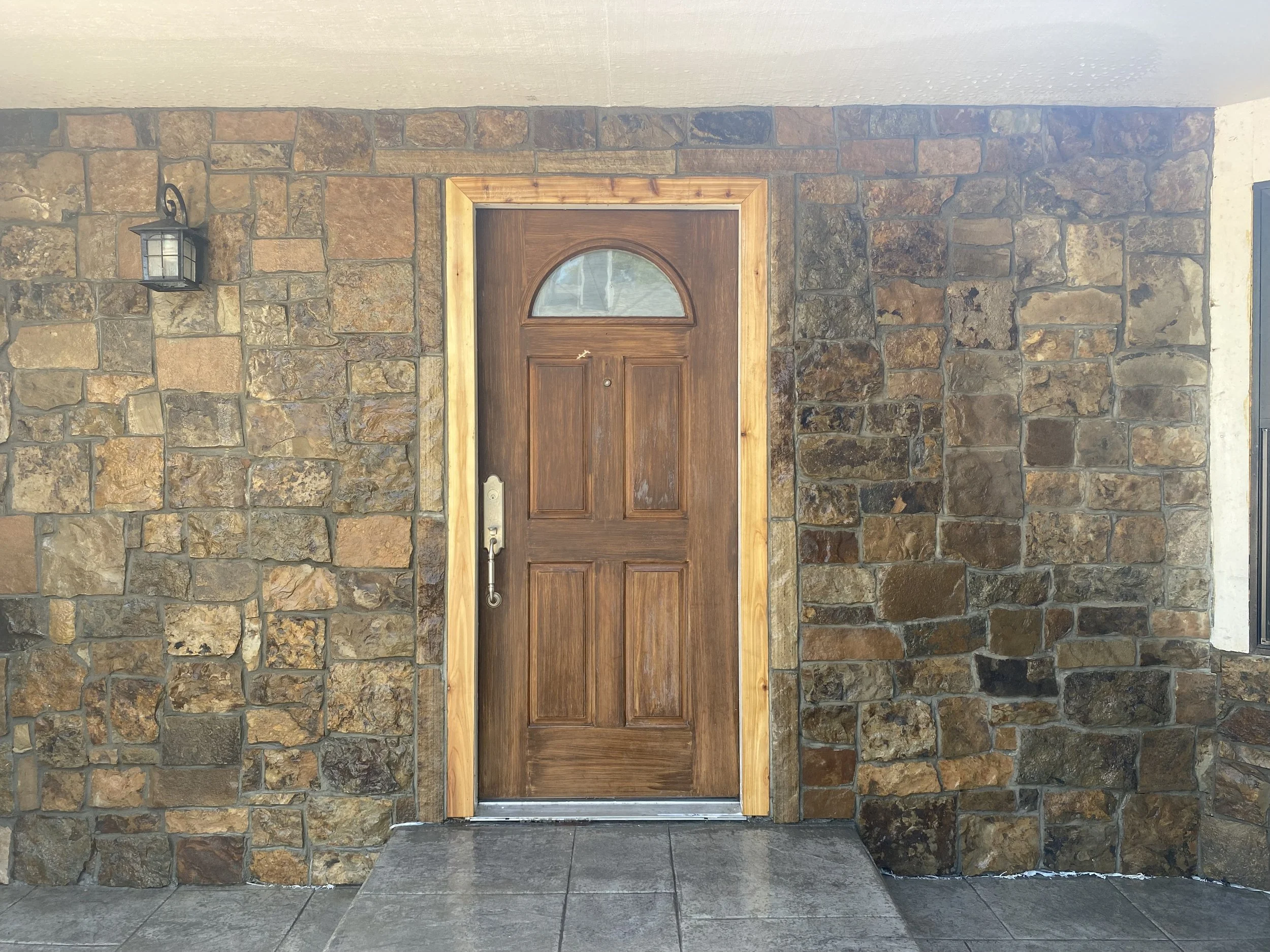 siding removed and stone veneer added 