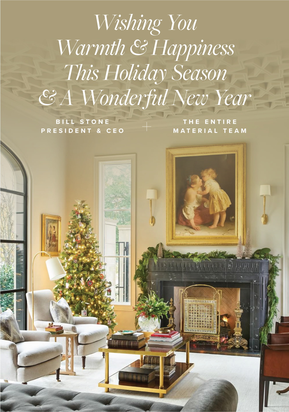 A festive living room decorated for Christmas with a lit Christmas tree, a portrait of two children above the fireplace, and holiday decor on the mantle. There are sofas, a coffee table with books, and large windows letting in natural light.