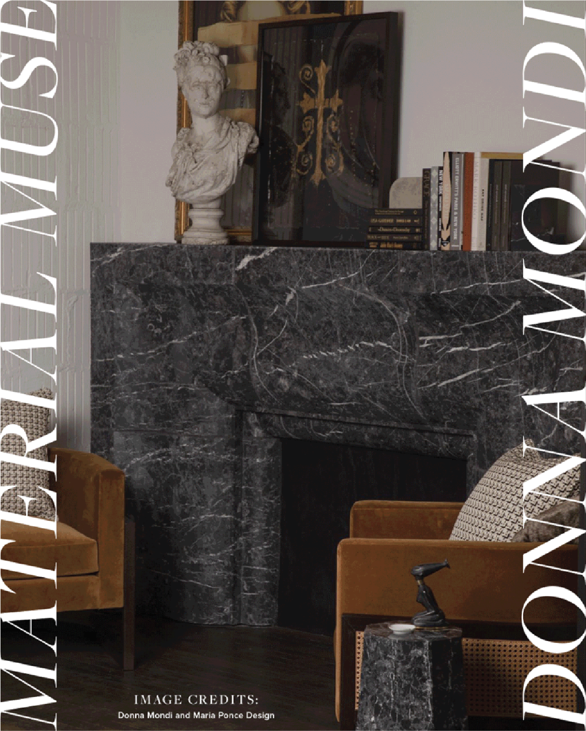 Interior of a room featuring a black marble fireplace, a classical white bust sculpture, a small table with a sculpture, a bookshelf, and two mustard-colored armchairs.
