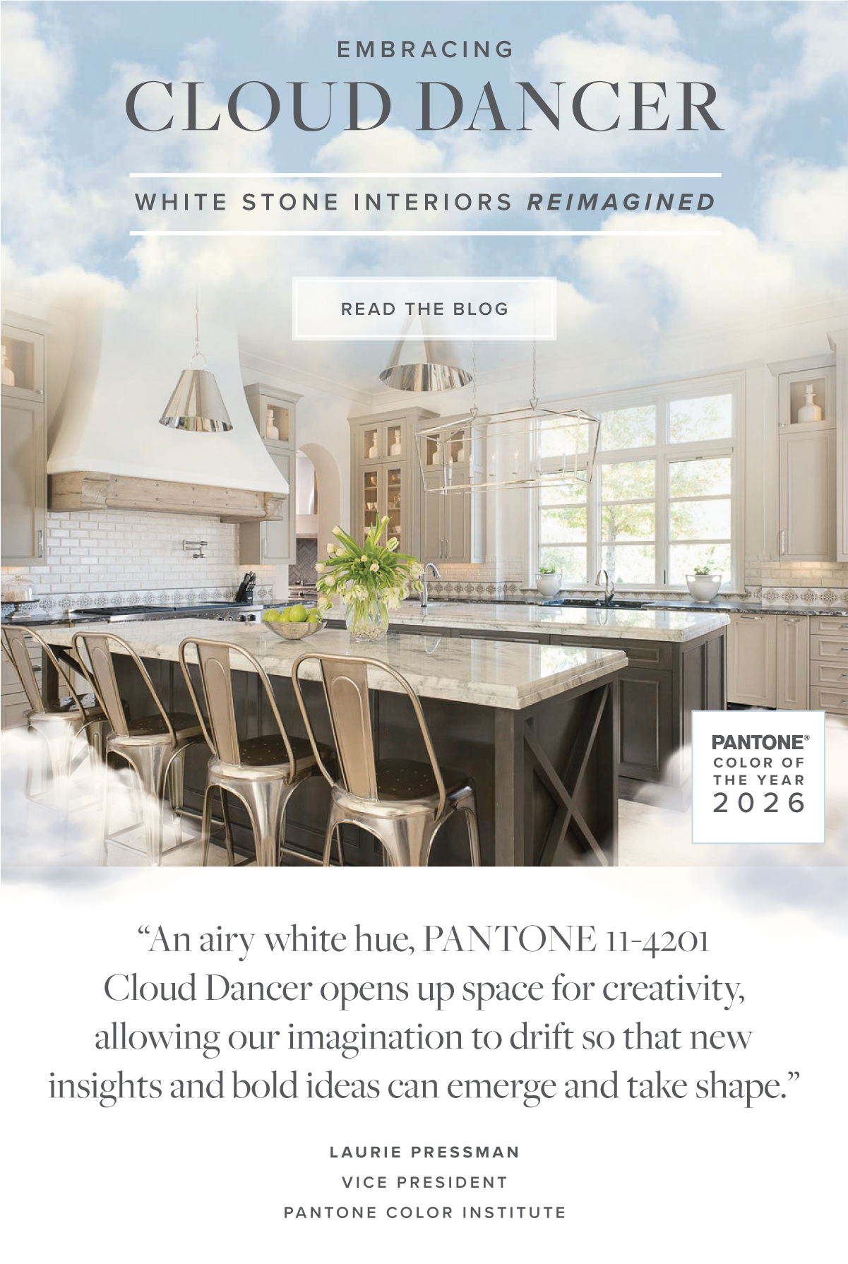 A kitchen with a white ceiling, large windows, and a kitchen island with a marble countertop. There are modern pendant lights, a vase with flowers, and several bowls on the counter. Text on the image discusses embracing Cloud Dancer in white stone interiors, Pantone's color of the year 2026, and includes a quote about the color expressed as an airy white hue.