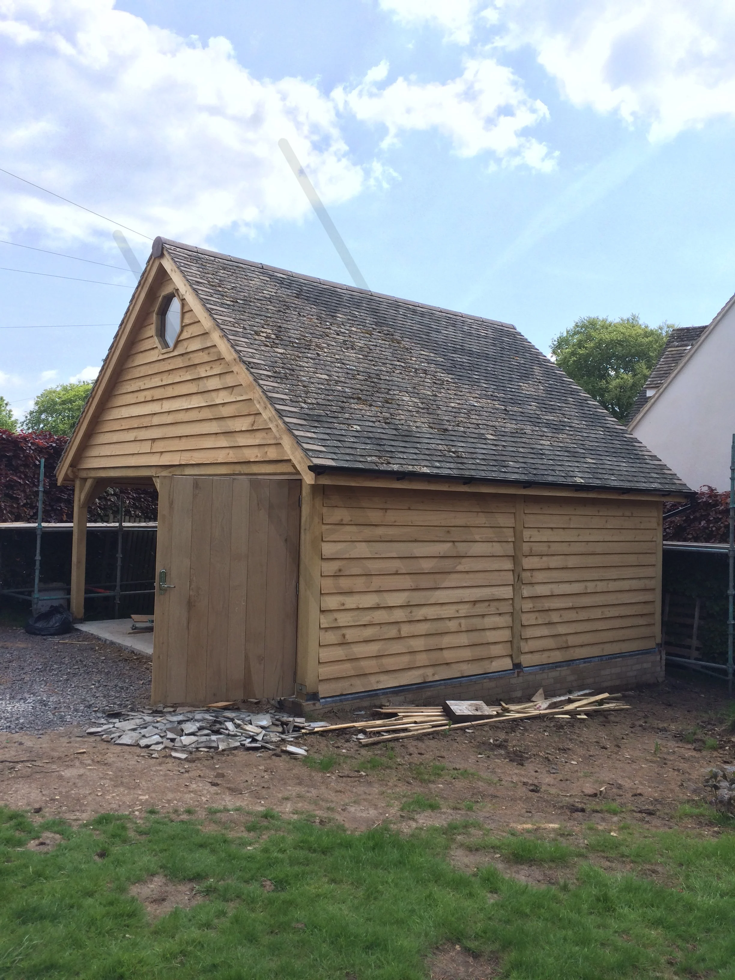 Car port and double garage built from chestnut