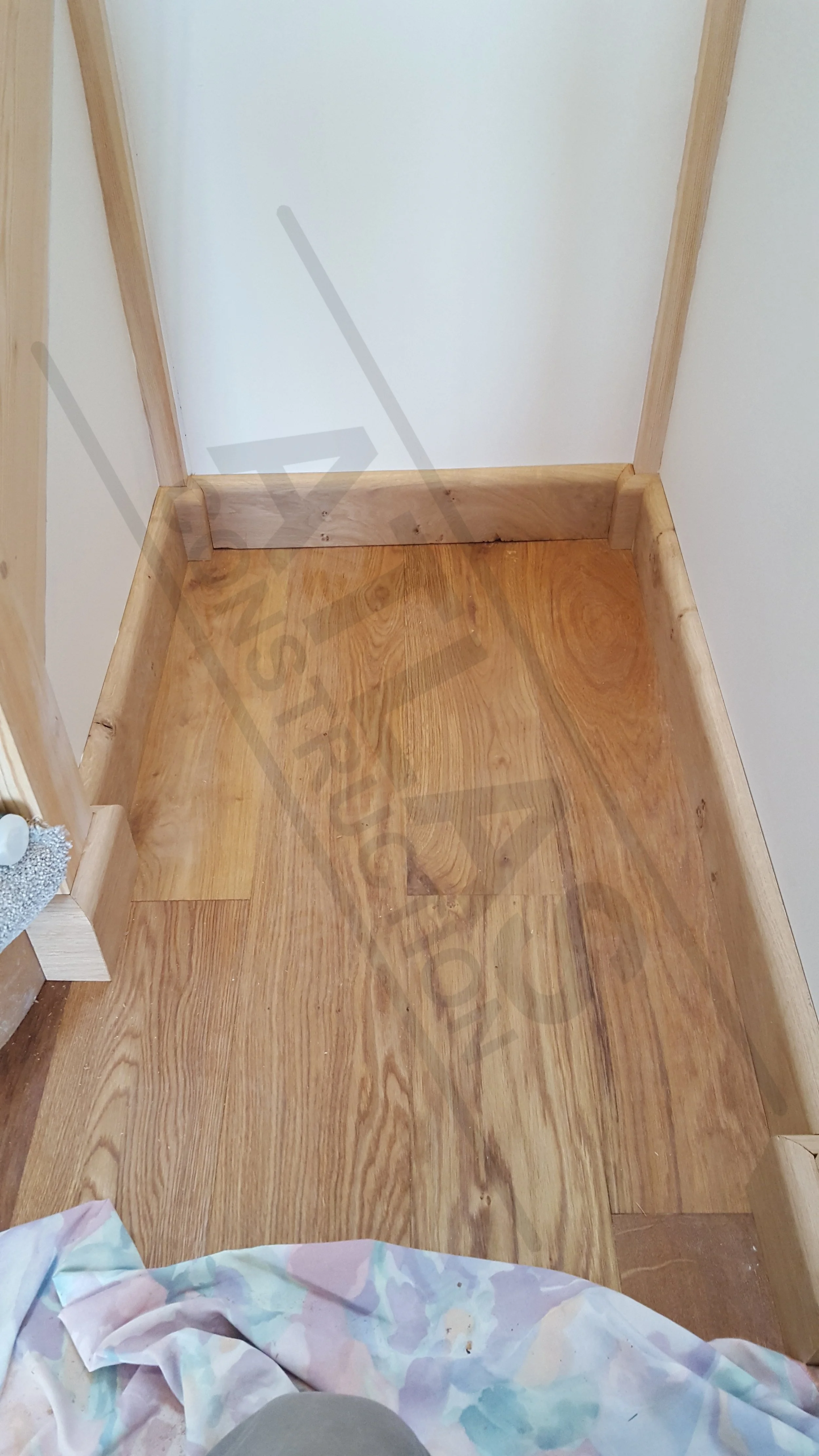 Engineered wood flooring and oak skirting