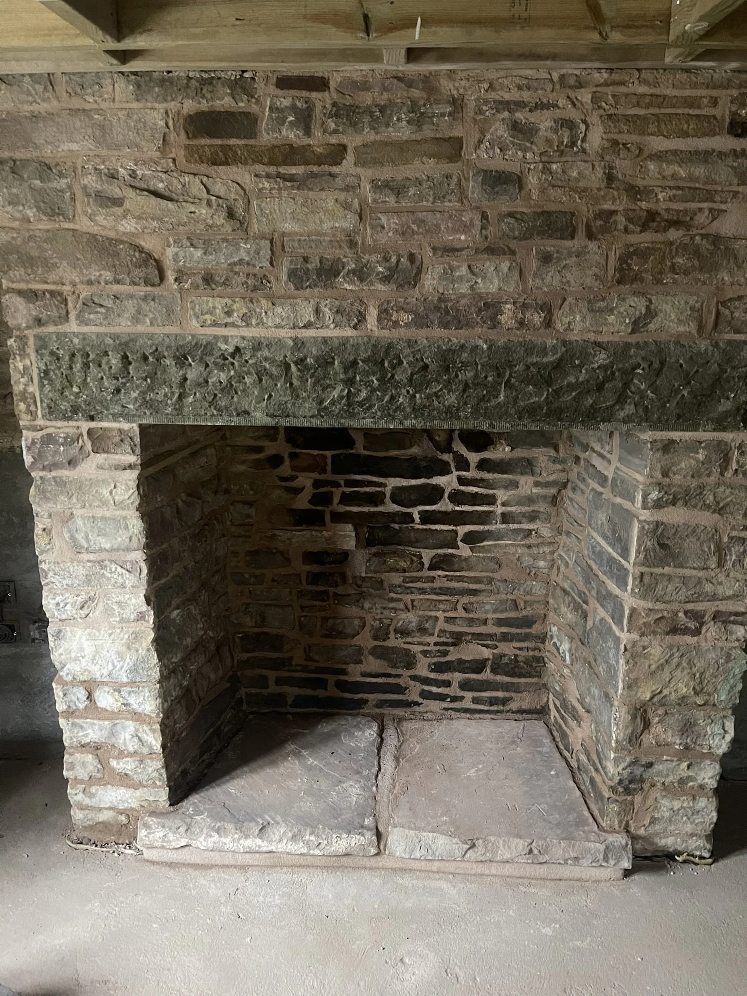 Repair/rebuild of stone fireplace