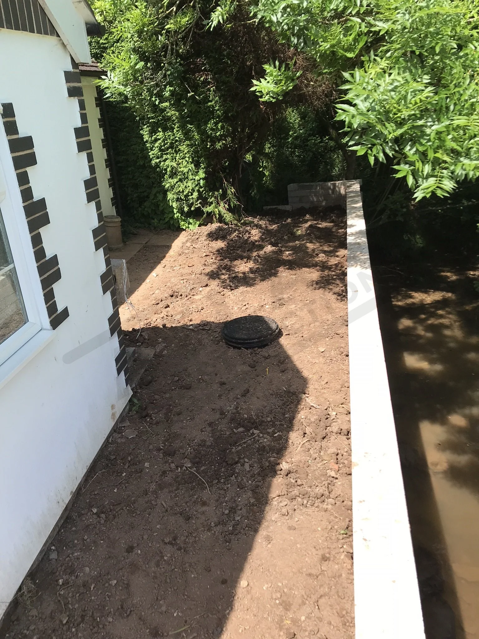Replacement of retaining wall next to small river