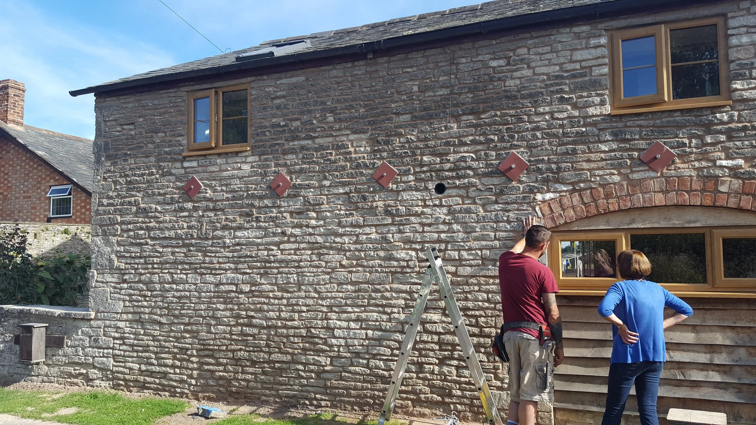 Repointed and repaired stonework on barn conversion