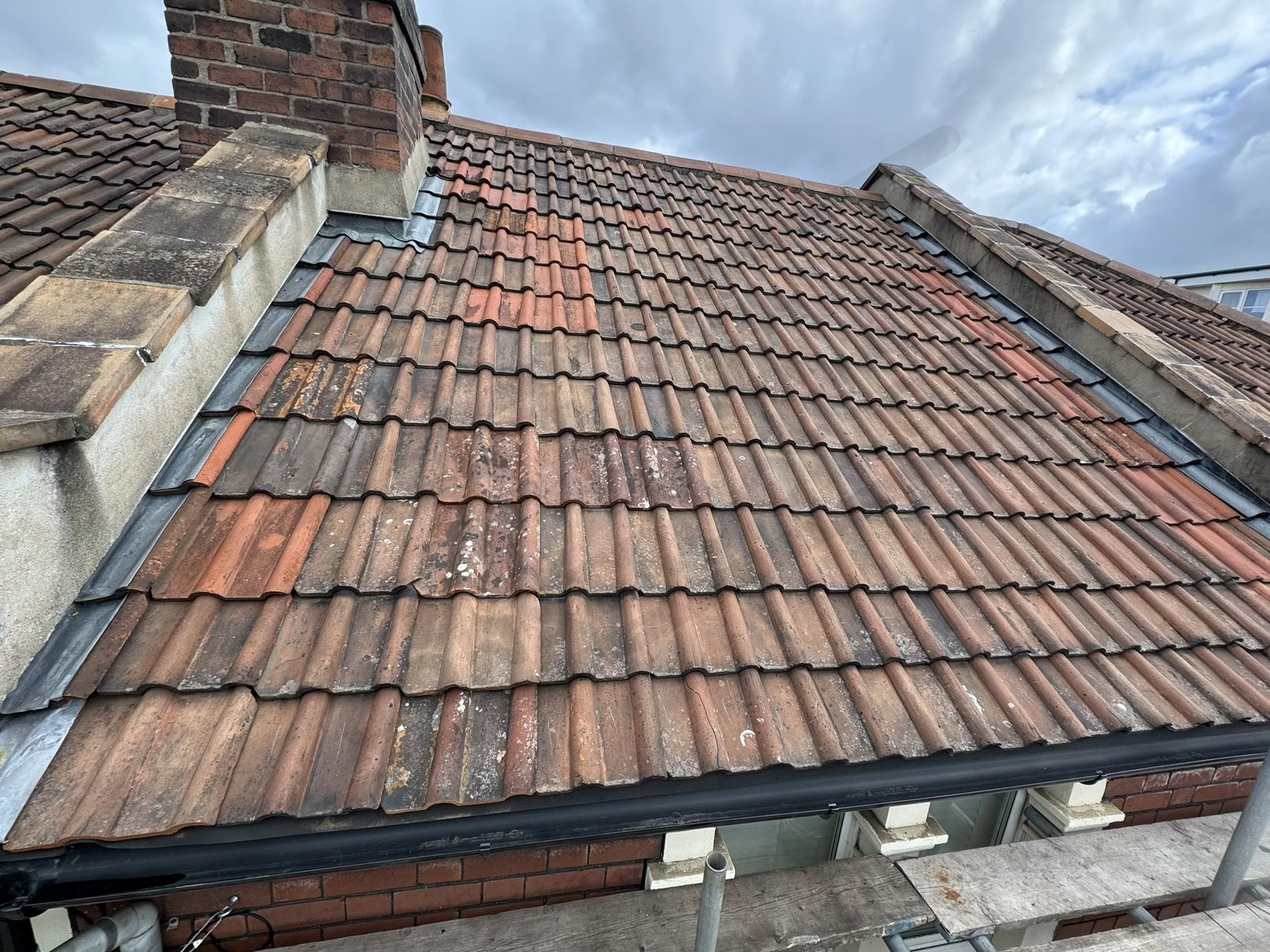 Roof repairs, re-felt and refit tiles