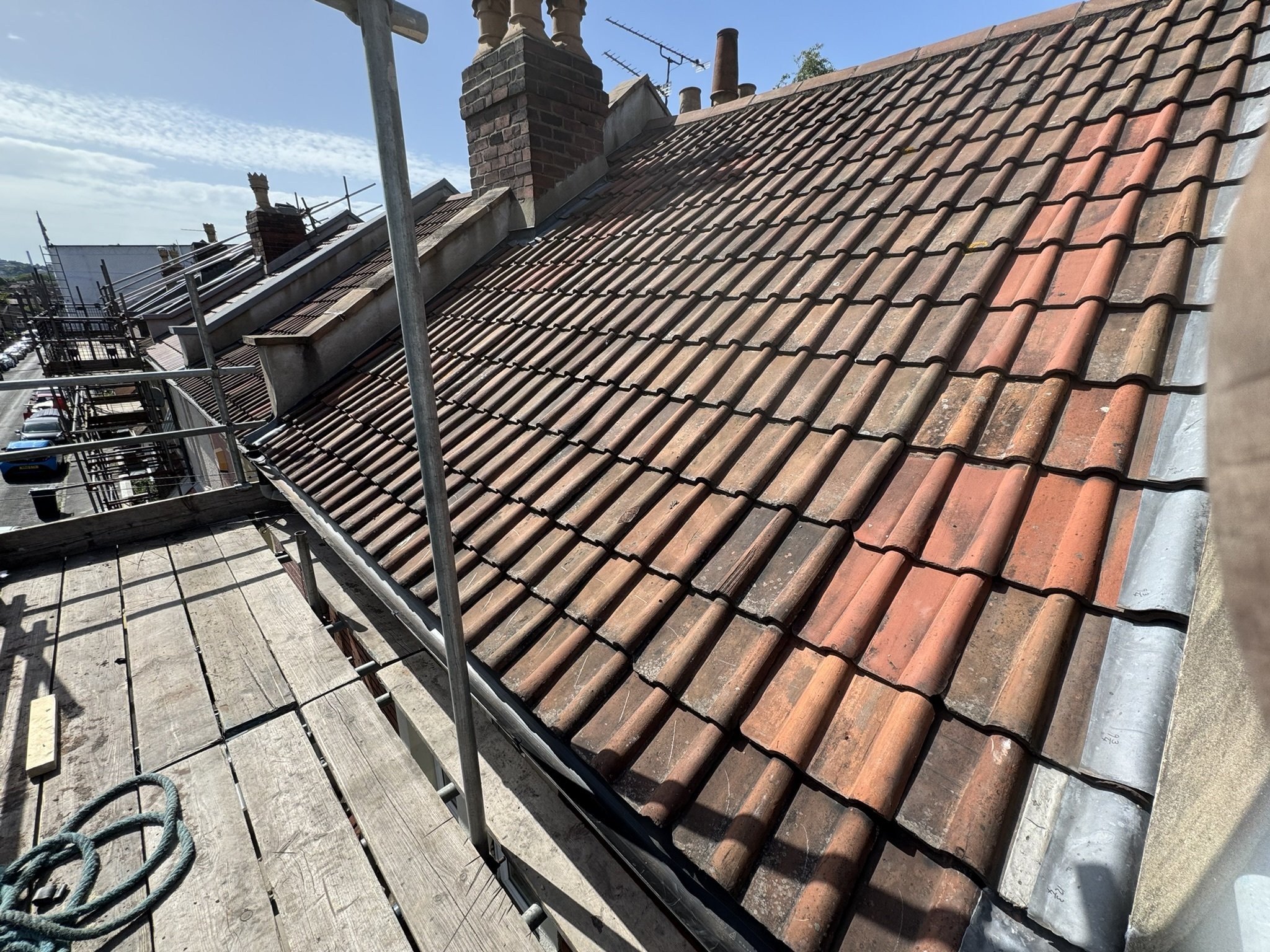 Roof repairs, re-felt and refit tiles