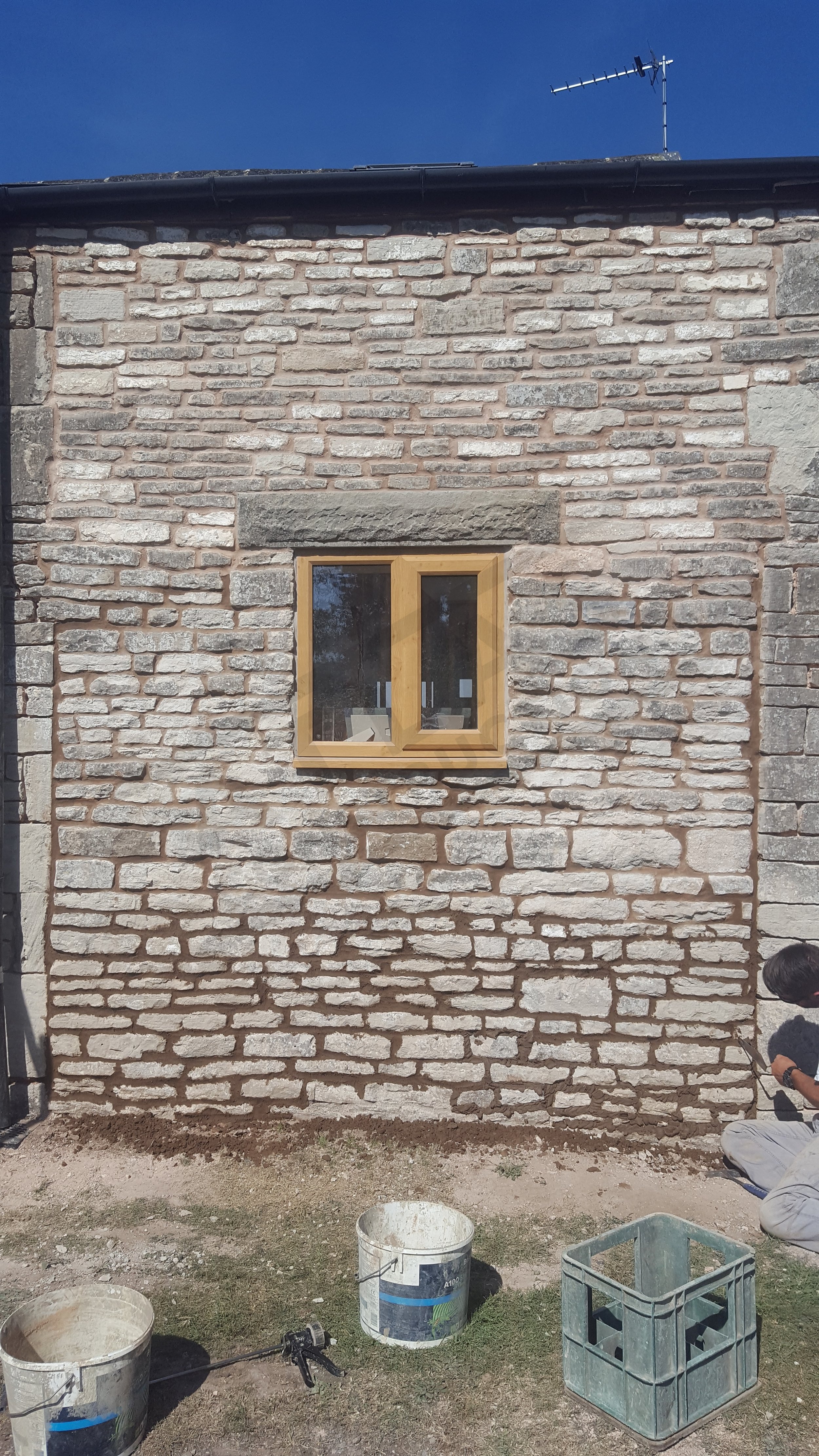 Rebuilt and repointed stonework on barn conversion
